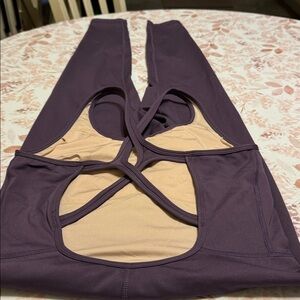 Women's Purple Pilates bodysuit workout.
Was a gift n it's too small 4 my frame.